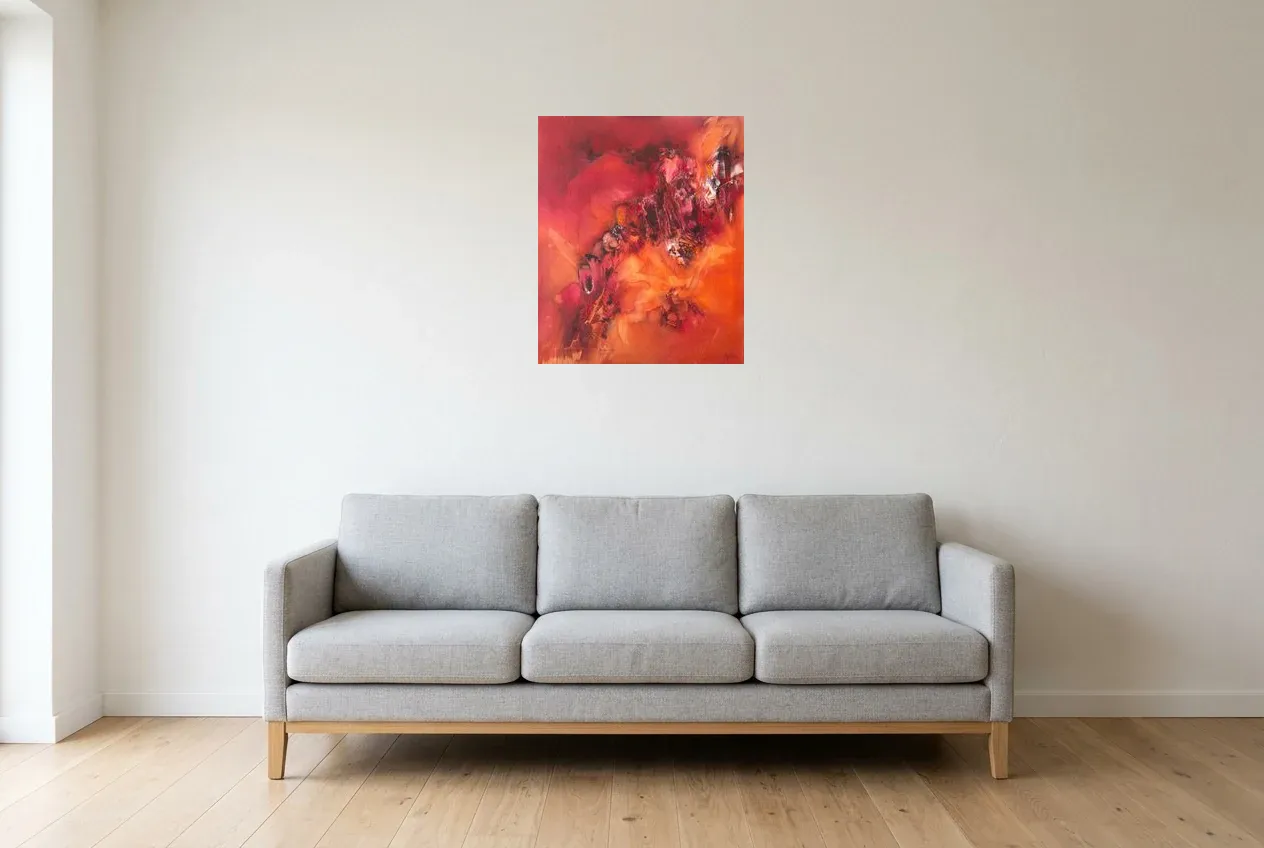 Tableau Abstrait Rouge 25 “Énergie”, peinture originale à l'huile par Régine Gardan, 50 × 60 cm, tableau rouge accroché dans un salon